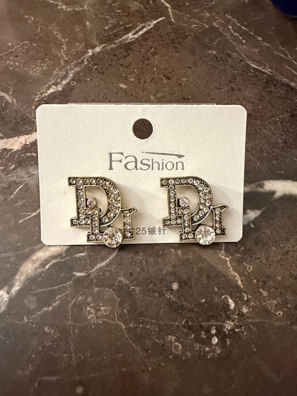 Crystal-Embellished 'D' Logo Stud Earrings
Fashion accessories